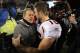 FOXBORO, MA - JANUARY 14: Tim Tebow #15 (R) of the Denver Broncos congraulates head coach Bill Belichick of the New England Patriots after the Patriots won 45-10 during their AFC Divisional Playoff Game at Gillette Stadium on January 14, 2012 in Foxboro, Massachusetts. (Photo by Jim Rogash/Getty Images)