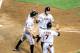 PHOENIX, AZ - MAY 01: Brandon Belt #9 of the San Francisco Giants celebrates a three-run home run with teammates Gregor Blanco #7 and Hunter Pence #8 against the Arizona Diamondbacks at Chase Field on May 1, 2013 in Phoenix, Arizona. (Photo by Norm Hall/Getty Images)