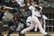 CHICAGO, IL - APRIL 06: Conor Gillaspie #12 of the Chicago White Sox hits a triple in the 5th inning against the Seattle Mariners at U.S. Cellular Field on April 6, 2013 in Chicago, Illinois. The White Sox defeated the Mariners 4-3. (Photo by Jonathan Daniel/Getty Images)