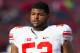 Nov 17, 2012; Madison, WI, USA; Ohio State Buckeyes defensive lineman Johnathan Hankins (52) during warmups prior to the game against the Wisconsin Badgers at Camp Randall Stadium. Ohio State defeated Wisconsin 21-14 in overtime. Mandatory Credit: Jeff Hanisch-USA TODAY Sports
