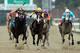 LOUISVILLE, KY - MAY 04: Believe You Can ridden by Rosie Napravnik finishes ahead of Broadway's Alibi ridden by John Velazque to win the 138th running of the Kentucky Oaks at Churchill Downs on May 4, 2012 in Louisville, Kentucky. (Photo by Elsa/Getty Images)