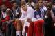 LOS ANGELES, CA - APRIL 30: Blake Griffin #32 (center, in white) of the Los Angeles Clippers watches from the bench after leaving the game with an ankle injury against the Memphis Grizzlies during Game Five of the Western Conference Quarterfinals of the 2013 NBA Playoffs at Staples Center on April 30, 2013 in Los Angeles, California. The Grizlies won 103-93. NOTE TO USER: User expressly acknowledges and agrees that, by downloading and or using this photograph, User is consenting to the terms and conditions of the Getty Images License Agreement. (Photo by Stephen Dunn/Getty Images)