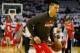 HOUSTON, TX - APRIL 27: Jeremy Lin #7 of the Houston Rockets waits on the court before meeting the Oklahoma Thunder in Game Three of the Western Conference Quarterfinals of the 2013 NBA Playoffs at the Toyota Center on April 27, 2013 in Houston, Texas. NOTE TO USER: User expressly acknowledges and agrees that, by downloading and or using this photograph, User is consenting to the terms and conditions of the Getty Images License Agreement. (Photo by Scott Halleran/Getty Images) . (Photo by Scott Halleran/Getty Images)