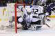 ST. LOUIS, MO - MAY 2: Anze Kopitar #11 of the Los Angeles Kings slides into the goal against the St. Louis Blues in Game Two of the Western Conference Quarterfinals during the 2013 NHL Stanley Cup Playoffs at the Scottrade Center on May 2, 2013 in St. Louis, Missouri. The Blues beat the Kings 2-1. (Photo by Dilip Vishwanat/Getty Images)