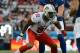 January 27, 2013; Honolulu, HI, USA; AFC defensive end Cameron Wake of the Miami Dolphins (91) rushes in the fourth quarter against the NFC during the 2013 Pro Bowl at Aloha Stadium. The NFC defeated the AFC 62-35. Mandatory Credit: Kyle Terada-USA TODAY Sports