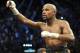 May 4, 2013; Las Vegas, NV, USA; Floyd Mayweather holds his championship belt after his WBC Welterweight title fight defeating Robert Guerrero at the MGM Grand Garden Arena. Mandatory Credit: Jayne Kamin-Oncea-USA TODAY Sports