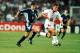 30 Jun 1998: Michael Owen of England shrugs off Jose Chamot of Argentina on his way to goal during the World Cup second round match at the Stade Geoffroy Guichard in St Etienne, France. England lost 4-3 on penalties after a 2-2 draw. \ Mandatory Credit:Ross Kinnaird /Allsport