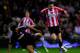 SUNDERLAND, ENGLAND - MAY 06: Adam Johnson of Sunderland skips past a challenge from Ryan Shotton of Stoke City during the Barclays Premier League match between Sunderland and Stoke City at the Stadium of Light on May 06, 2013 in Sunderland, England. (Photo by Stu Forster/Getty Images)