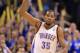 OKLAHOMA CITY, OK - MAY 05: Kevin Durant #35 of the Oklahoma City Thunder celebrates a play against the Memphis Grizzlies during Game One of the Western Conference Semifinals of the 2013 NBA Playoffs at Chesapeake Energy Arena on May 5, 2013 in Oklahoma City, Oklahoma. NOTE TO USER: User expressly acknowledges and agrees that, by downloading and or using this photograph, User is consenting to the terms and conditions of the Getty Images License Agreement. (Photo by Ronald Martinez/Getty Images)