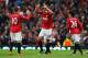MANCHESTER, ENGLAND - APRIL 22: Robin van Persie of Manchester United celebrates scoring his second goal with Wayne Rooney and Shinji Kagawa during the Barclays Premier League match between Manchester United and Aston Villa at Old Trafford on April 22, 2013 in Manchester, England. (Photo by Alex Livesey/Getty Images)