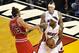 May 8, 2013; Miami, FL, USA; Miami Heat small forward LeBron James (6) and Chicago Bulls center Joakim Noah (13) push each other during the first quarter in game two of the second round of the 2013 NBA Playoffs at American Airlines Arena. Mandatory Credit: Steve Mitchell-USA TODAY Sports