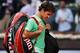 MADRID, SPAIN - MAY 09: Roger Federer of Switzerland trudges off the pitch after his match against Kei Nishikori of Japan on day six of the Mutua Madrid Open tennis tournament at the Caja Magica on May 9, 2013 in Madrid, Spain. (Photo by Gonzalo Arroyo Moreno/Getty Images)