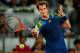 MADRID, SPAIN - MAY 09: Andy Murray of Great Britain plays a backhand to Gilles Simon of France during his match on day six of the Mutua Madrid Open tennis tournament at the Caja Magica on May 9, 2013 in Madrid, Spain. (Photo by Gonzalo Arroyo Moreno/Getty Images)