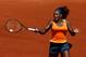 MADRID, SPAIN - MAY 11: Serena Williams of the US plays a backhand to Sara Errani of Italy during her semi-final match on day eight of the Mutua Madrid Open tennis tournament at the Caja Magica on May 11, 2013 in Madrid, Spain. (Photo by Gonzalo Arroyo Moreno/Getty Images)