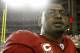 GLENDALE, AZ - JANUARY 10: Linebacker Karlos Dansby #58 of the Arizona Cardinals walks off the field after defeating the Green Bay Packers 51-45 in the 2010 NFC wild-card playoff game at University of Phoenix Stadium on January 10, 2010 in Glendale, Arizona. (Photo by Jeff Gross/Getty Images)