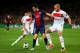 BARCELONA, SPAIN - APRIL 10: Cesc Fabregas of Barcelona is challenged by Alex of PSG during the UEFA Champions League quarter-final second leg match between Barcelona and Paris St Germain at Nou Camp on April 10, 2013 in Barcelona, Spain. (Photo by Jasper Juinen/Getty Images)