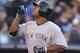 KANSAS CITY, MO - MAY 11: Vernon Wells #12 of the New York Yankees celebrates his two-run home run in the fifth inning against the Kansas City Royals at Kauffman Stadium on May 11, 2013 in Kansas City, Missouri. (Photo by Ed Zurga/Getty Images)