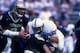 19 Sep 1998: Quarterback Matt Lytle #8 of the Pittsburgh Panthers runs with the ball during a game against the Penn State Nittany Lions at the Pitt Stadium in Pittsburgh, Pennsylvania. The Nittany Lions defeated the Panthers 20-13.