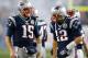 FOXBORO, MA - DECEMBER 10: Tom Brady #12 of the New England Patriots reacts with Ryan Mallett #15 against the Houston Texans at Gillette Stadium on December 10, 2012 in Foxboro, Massachusetts. (Photo by Jim Rogash/Getty Images)
