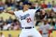 LOS ANGELES, CA - MAY 15: Zack Greinke #21 of the Los Angeles Dodgers throws a pitch against the Washington Nationals at Dodger Stadium on May 15, 2013 in Los Angeles, California. (Photo by Stephen Dunn/Getty Images)