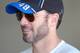 Jimmie Johnson smiles with crew members between practice runs at Daytona. Credit: Dwight Drum