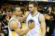 OAKLAND, CA - MAY 16: Stephen Curry #30 and David Lee #10 of the Golden State Warriors embrace after losing to the San Antonio Spurs in Game Six of the Western Conference Semifinals during the 2013 NBA Playoffs on May 16, 2013 at the Oracle Arena in Oakland, California. The Spurs won 94-82 to take the series 4-2. . NOTE TO USER: User expressly acknowledges and agrees that, by downloading and or using this photograph, User is consenting to the terms and conditions of the Getty Images License Agreement. Mandatory Copyright Notice: Copyright 2013 NBAE (Photo by StephenDunn/Getty Images) (Photo by Stephen Dunn/Getty Images)