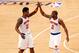 May 16, 2013; New York, NY, USA; New York Knicks small forward Iman Shumpert (21) and point guard Raymond Felton (2) high five each other on the court against the Indiana Pacers during the second half in game five of the second round of the 2013 NBA Playoffs at Madison Square Garden. Knicks win 85-75. Mandatory Credit: Debby Wong-USA TODAY Sports
