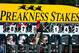 May 19, 2012;Baltimore, MD, USA; A worker changes the numbers on the starting gate prior to race 7 at Pimlico Race Course. Mandatory Credit: Evan Habeeb-USA TODAY Sports