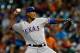 HOUSTON, TX - MAY 10: Alexi Ogando #41 of the Texas Rangers throws a pitch during the second inning against the Houston Astros at Minute Maid Park on May 10, 2013 in Houston, Texas. (Photo by Scott Halleran/Getty Images)
