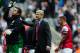 NEWCASTLE UPON TYNE, ENGLAND - MAY 19: Arsenal manager Arsene Wenger (c) celebrates with his players after the Barclays Premier League match between Newcastle United and Arsenal at St James' Park on May 19, 2013 in Newcastle upon Tyne, England. (Photo by Stu Forster/Getty Images)