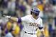 June 8, 2012; Baton Rouge, LA, USA; LSU Tigers outfielder Mason Katz (8) points to the LSU bench after hitting a home run in the 11th inning of game one of the Baton Rouge super regional at Alex Box Stadium. Mandatory Credit: Crystal Logiudice-USA TODAY Sports