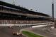 INDIANAPOLIS, IN - MAY 27: Charlie Kimball, driver of the #83 NovoLog FlexPen Honda, leads cars through turn one during the IZOD IndyCar Series 96th running of the Indianapolis 500 mile race at the Indianapolis Motor Speedway on May 27, 2012 in Indianapolis, Indiana. (Photo by Jonathan Ferrey/Getty Images)