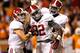 KNOXVILLE, TN - OCTOBER 20: C.J. Mosley #32 of the Alabama Crimson Tide celebrates an interception against Tennessee Volunteers with Vinnie Sunseri #3 and Quinton Dial #90 at Neyland Stadium on October 20, 2012 in Knoxville, Tennessee. (Photo by Kevin C. Cox/Getty Images)