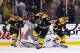BOSTON, MA - MAY 13: Patrice Bergeron #37, Tyler Seguin #19, and Brad Marchand #63 of the Boston Bruins celebrate following Bergeron's game-winning overtime goal against the Toronto Maple Leafs in Game Seven of the Eastern Conference Quarterfinals during the 2013 NHL Stanley Cup Playoffs on May 13, 2013 at TD Garden in Boston, Massachusetts. (Photo by Jared Wickerham/Getty Images)