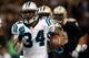 NEW ORLEANS, LA - DECEMBER 30: DeAngelo Williams #34 of the Carolina Panthers scores a touchdown as he runs past Elbert Mack #44 of the New Orleans Saints at the Mercedes-Benz Superdome on December 30, 2012 in New Orleans, Louisiana. (Photo by Chris Graythen/Getty Images)