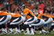 DENVER, CO - DECEMBER 2: Quarterback Peyton Manning #18 of the Denver Broncos adjusts the play at the line of scrimmage during a game against the Tampa Bay Buccaneers at Sports Authority Field Field at Mile High on December 2, 2012 in Denver, Colorado. (Photo by Dustin Bradford/Getty Images)