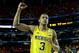ATLANTA, GA - APRIL 06: Trey Burke #3 of the Michigan Wolverines celebrates the Wolverines 61-56 victory against the Syracuse Orange during the 2013 NCAA Men's Final Four Semifinal at the Georgia Dome on April 6, 2013 in Atlanta, Georgia. (Photo by Streeter Lecka/Getty Images)