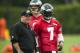 May 20, 2013; Philadelphia, PA, USA; Philadelphia Eagles head coach Chip Kelly talks with quarterback Michael Vick (7) during organized team activities at the NovaCare Complex. Mandatory Credit: Howard Smith-USA TODAY Sports