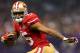 NEW ORLEANS, LA - FEBRUARY 03: Michael Crabtree #15 of the San Francisco 49ers runs in for a touchdown in the second half against the Baltimore Ravens during Super Bowl XLVII at the Mercedes-Benz Superdome on February 3, 2013 in New Orleans, Louisiana. (Photo by Mike Ehrmann/Getty Images)