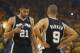 OAKLAND, CA - MAY 12: Tim Duncan #21 and Tony Parker #9 of the San Antonio Spurs #21 look on against Golden State Warriors in Game Four of the Western Conference Semifinals during the 2013 NBA Playoffs on May 12, 2013 at the Oracle Arena in Oakland, California. NOTE TO USER: User expressly acknowledges and agrees that, by downloading and or using this photograph, User is consenting to the terms and conditions of the Getty Images License Agreement. (Photo by Jed Jacobsohn/Getty Images)