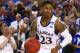 ARLINGTON, TX - MARCH 29: Ben McLemore #23 of the Kansas Jayhawks drives against the Michigan Wolverines during the South Regional Semifinal round of the 2013 NCAA Men's Basketball Tournament at Dallas Cowboys Stadium on March 29, 2013 in Arlington, Texas. (Photo by Ronald Martinez/Getty Images)