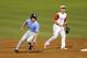 May 25, 2013; Durham, NC, USA; North Carolina Tar Heels first baseman Cody Stubbs (25) rounds second past North Carolina State Wolfpack second baseman Logan Ratledge (6) during the ACC baseball tournament at Durham Bulls Athletic Park. Mandatory Credit: Liz Condo-USA TODAY Sports