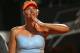 ROME, ITALY - MAY 16: Maria Sharapova of Russia blows a kiss to the crowd after her straight sets victory against Sloane Stephens of the USA in their third round match during day five of the Internazionali BNL d'Italia 2013 at the Foro Italico Tennis Centre on May 16, 2013 in Rome, Italy. (Photo by Clive Brunskill/Getty Images)