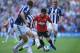 WEST BROMWICH, ENGLAND - MAY 19: Shinji Kagawa of Manchester United takes on the West Bromwich Albion defence during the Barclays Premier League match between West Bromwich Albion and Manchester United at The Hawthorns on May 19, 2013 in West Bromwich, England. (Photo by Richard Heathcote/Getty Images)