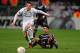 LYON, FRANCE - FEBRUARY 21: Scott Parker of Spurs battles with Clement Grenier of Olympique Lyonnais during the UEFA Europa League Round of 32, second leg match between Olympique Lyonnais and Tottenham Hotspur FC at Stade de Gerland on February 21, 2013 in Lyon, France. (Photo by Jamie McDonald/Getty Images)
