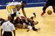 INDIANAPOLIS, IN - MAY 28: Ray Allen #34 of the Miami Heat falls to the court on top of Paul George #24 of the Indiana Pacers as he attempts to chase down a loose ball in the fourt quarter against George and Roy Hibbert #55 of the Pacers during Game Four of the Eastern Conference Finals of the 2013 NBA Playoffs at Bankers Life Fieldhouse on May 28, 2013 in Indianapolis, Indiana. NOTE TO USER: User expressly acknowledges and agrees that, by downloading and or using this photograph, User is consenting to the terms and conditions of the Getty Images License Agreement. (Photo by Joe Robbins/Getty Images)
