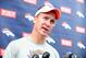 May 20, 2013; Englewood, CO, USA; Denver Broncos quarterback Peyton Manning (18) speaks to the media following organized team activities at the Broncos training facility. Mandatory Credit: Ron Chenoy-USA TODAY Sports