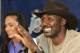 SALT LAKE CITY - FEBRUARY 13: Karl Malone gestures as he announces his retirement from playing NBA basketball as his wife Kay (L) listens on February 13, 2005 at the Delta Center in Salt Lake City, Utah. Malone played 19 years in the NBA, 18 with the Utah Jazz and his last year with the Los Angeles Lakers. Malone is currently second on the all time scoring list. (Photo by George Frey/Getty Images)