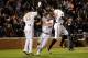 BALTIMORE, MD - APRIL 22: Chris Davis #19 of the Baltimore Orioles celebrates scoring the game winning run with Manny Machado #13 and Adam Jones #10 during the Orioles 2-1 win over the Toronto Blue Jays at Oriole Park at Camden Yards on April 22, 2013 in Baltimore, Maryland. (Photo by Rob Carr/Getty Images)