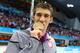 LONDON, ENGLAND - AUGUST 04: Gold medallist Michael Phelps of the United States kisses his medal following the medal ceremony for the Men's 4x100m medley Relay Final on Day 8 of the London 2012 Olympic Games at the Aquatics Centre on August 4, 2012 in London, England. (Photo by Al Bello/Getty Images)